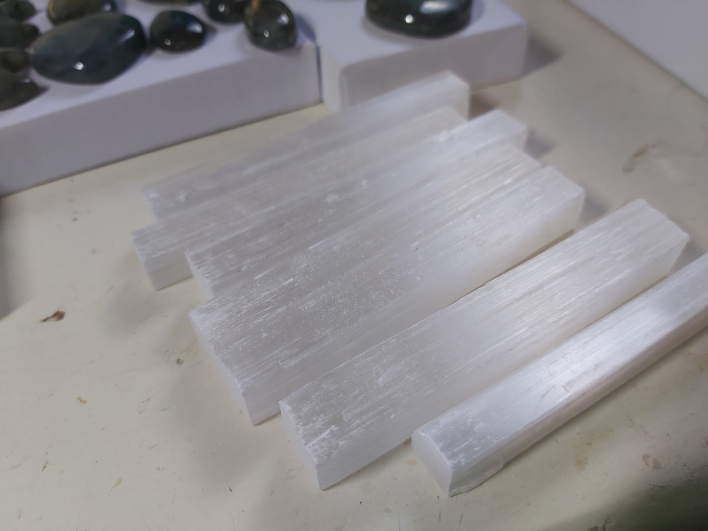 
Selenite Sticks are more than just beautiful crystals - they are a powerful tool to charge other crystals, promote clarity, and cleanse negative energy. Keep one for yourself or give as a unique and meaningful gift. With these sticks, you'll see and feel the benefits of selenite firsthand.