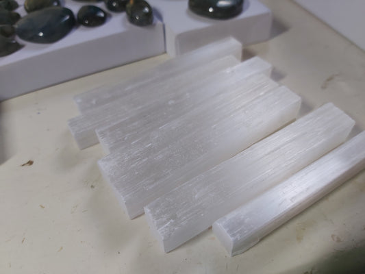 
Selenite Sticks are more than just beautiful crystals - they are a powerful tool to charge other crystals, promote clarity, and cleanse negative energy. Keep one for yourself or give as a unique and meaningful gift. With these sticks, you'll see and feel the benefits of selenite firsthand.